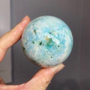 PHOENIX CRYSTAL SPHERE WITH DRUZY POCKETS